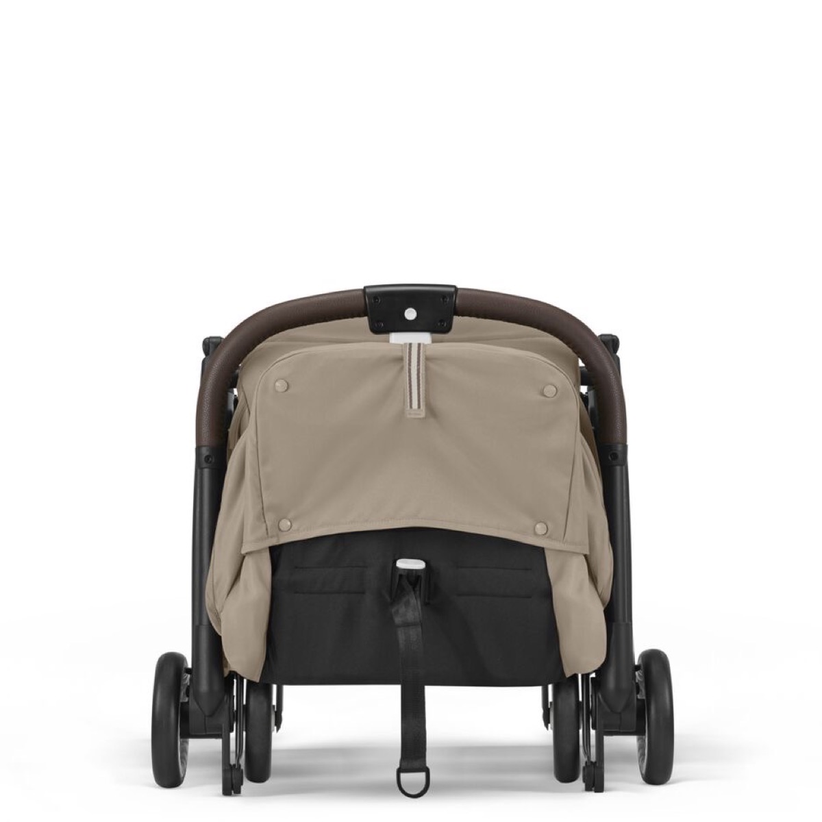 CYBEX Orfeo (manufacturer photo, Almond Beige) shown folded into its compact travel size