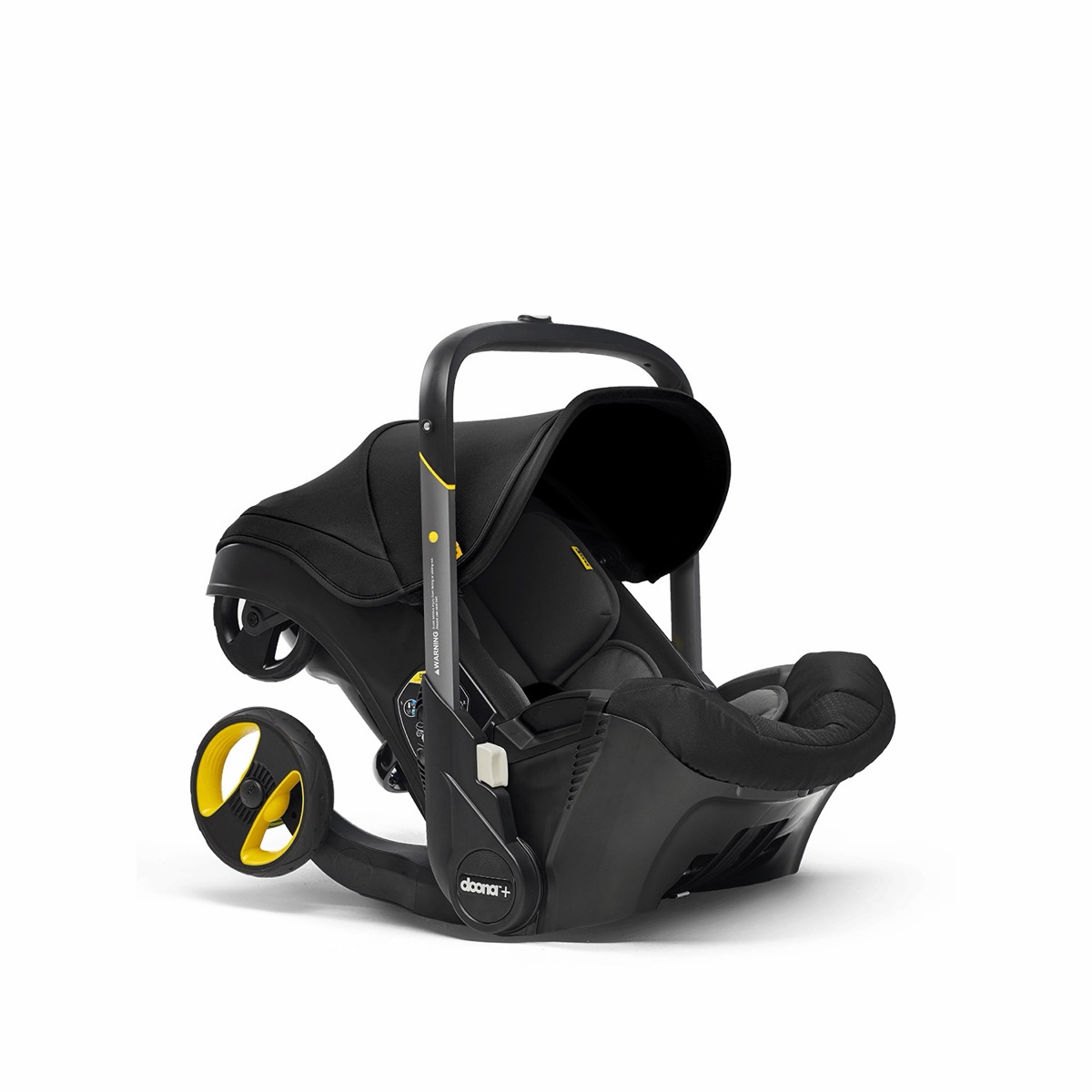 Doona + in Nitro Black folded for transport, angled view