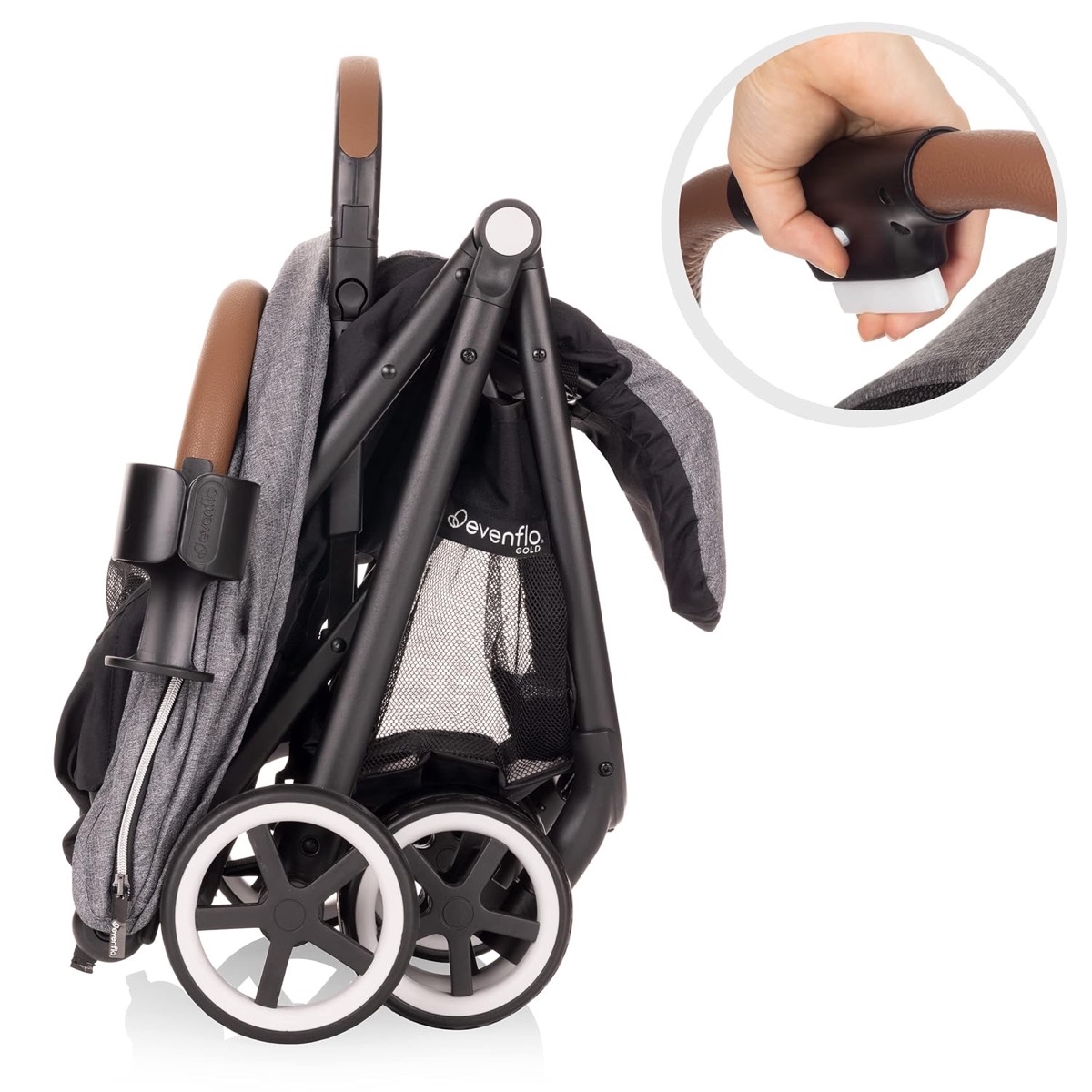 Evenflo Gold Otto Self-Folding stroller folded and standing on its own with the cupholder mounted, and an inset of a hand pressing the fold button on the handle